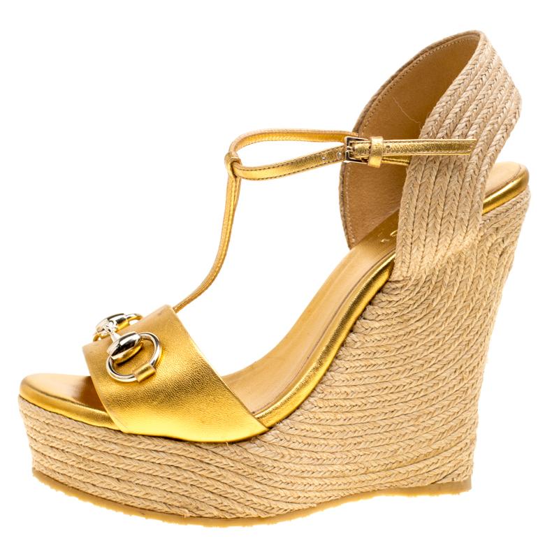 Gucci Gold Metallic Leather Horsebit T-Strap Espadrille Wedge Sandals Size  36.5 at 1stDibs | gold gucci wedges, gold metallic wedge sandals