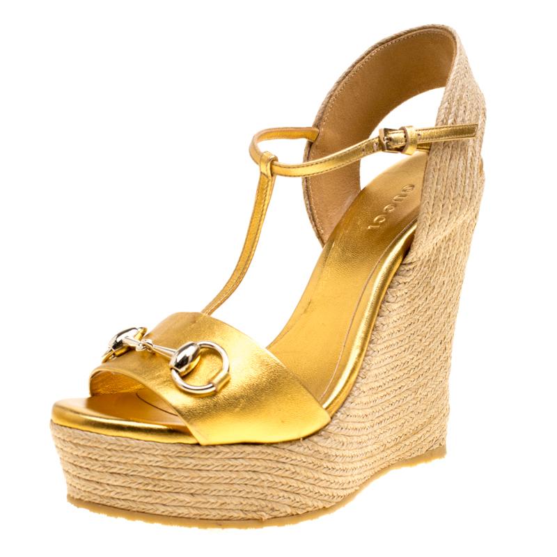 Gucci Gold Metallic Leather Horsebit T-Strap Espadrille Wedge Sandals Size  36.5 at 1stDibs | gold gucci wedges, gold metallic wedge sandals