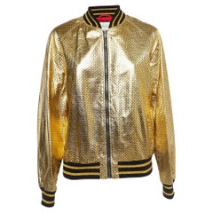Gucci Giacca bomber in pelle stropicciata con stampa a stelle metalliche oro XS