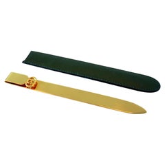 Tagliacarte Gucci placcato oro con custodia in pelle verde e scatola originale