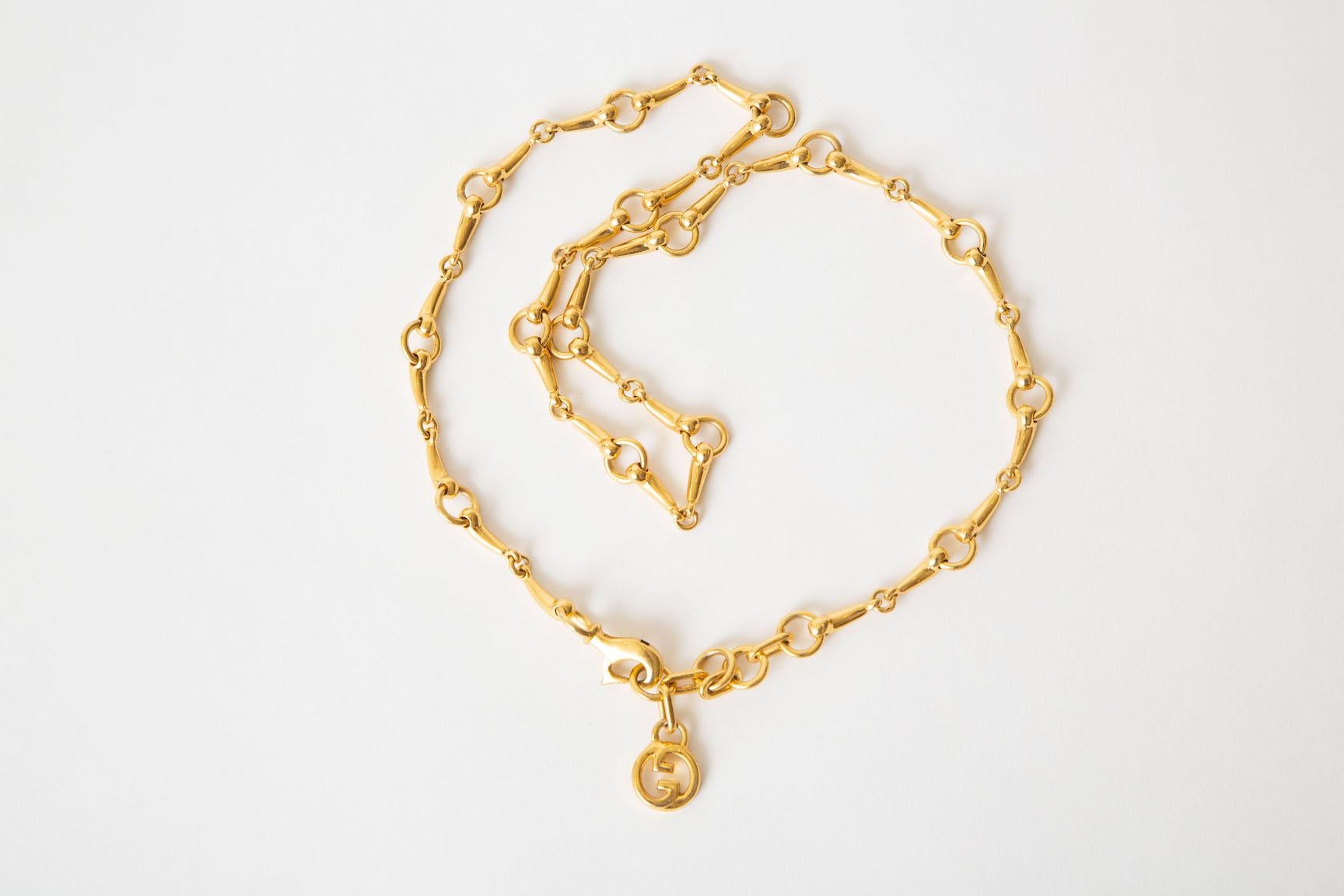 This fabulous 1970's Italian Gucci gold plated necklace is a true staple for your all season wardrobe. it is classic and iconic. This could be coupled with other Gucci necklaces should you have any. Labeled Gucci Italy. The Gucci tag of GG's should