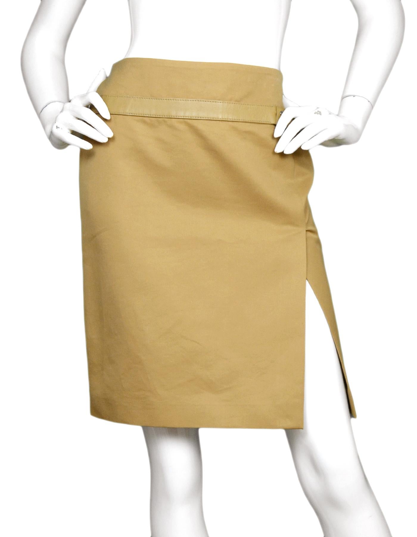 Gucci Gold/Tan Cotton Pencil Skirt W/ Side Slit & Leather Trim Sz 40

Made In: Italy
Color: Gold/tan
Materials: 100% cotton, leather
Lining: 100% rayon
Overall Condition: Excellent pre-owned condition with exception of some loose threads at leather