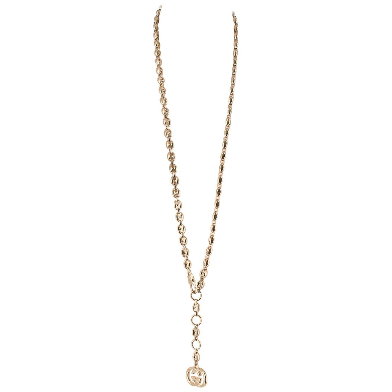 Gucci Gold Tone Mariner Link Chain Belt

-Chain belt with 'GG' charm
-Lobster clasp closure
-Adjustable length

Please note, these items are pre-owned and may show signs of being stored even when unworn and unused. This is reflected within the