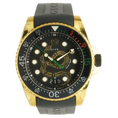 Gucci Gold Tone Stainless Steel and Black Rubber Dive