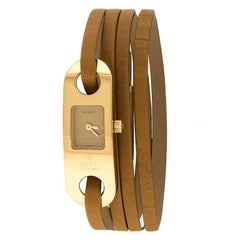 Gucci Montre-bracelet pour femme 14 mm en cuir et acier inoxydable de couleur or avec porte-clés 6100L