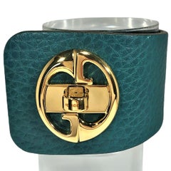 Gucci Gold Tone Turnkey GG  Teal Color Embossed Leather Bracelet