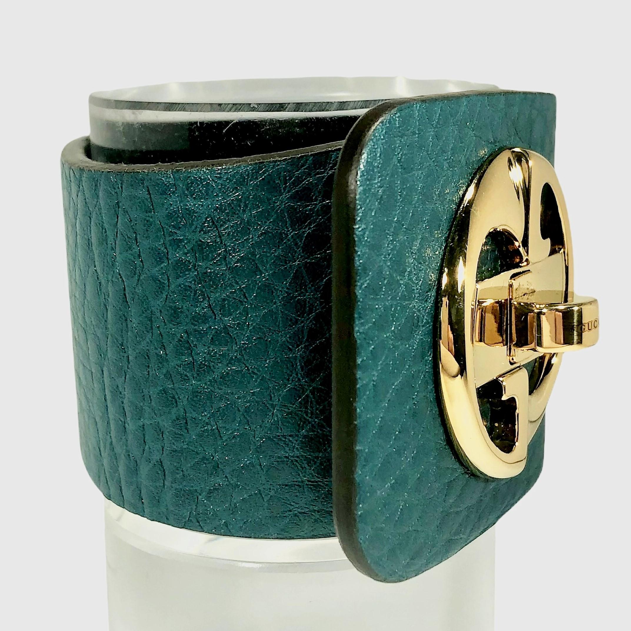 Gucci Gold Tone Turnkey GG  Teal Color Embossed Leather Bracelet  In Excellent Condition For Sale In Palm Beach, FL