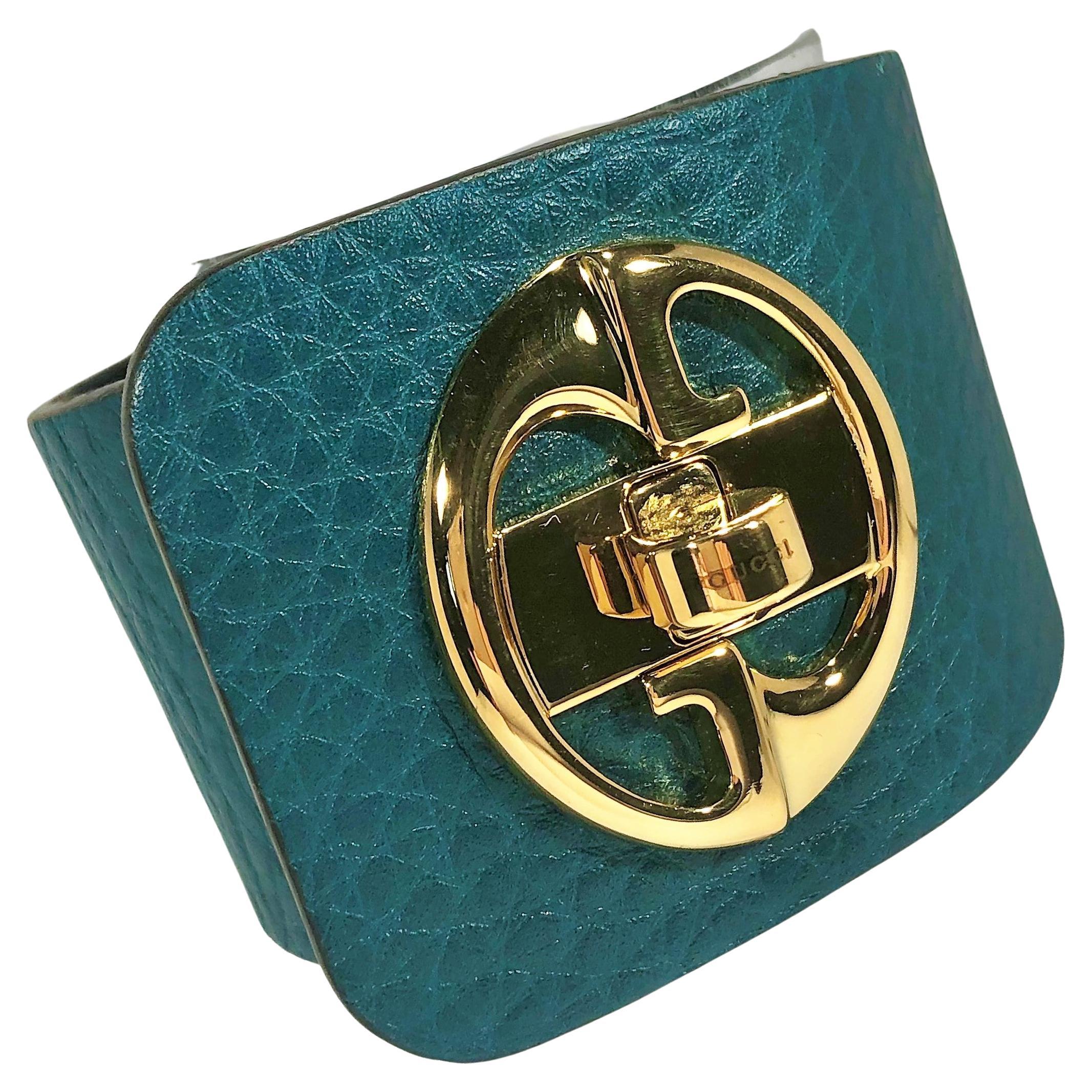 Gucci Gold Tone Turnkey GG  Teal Color Embossed Leather Bracelet  For Sale