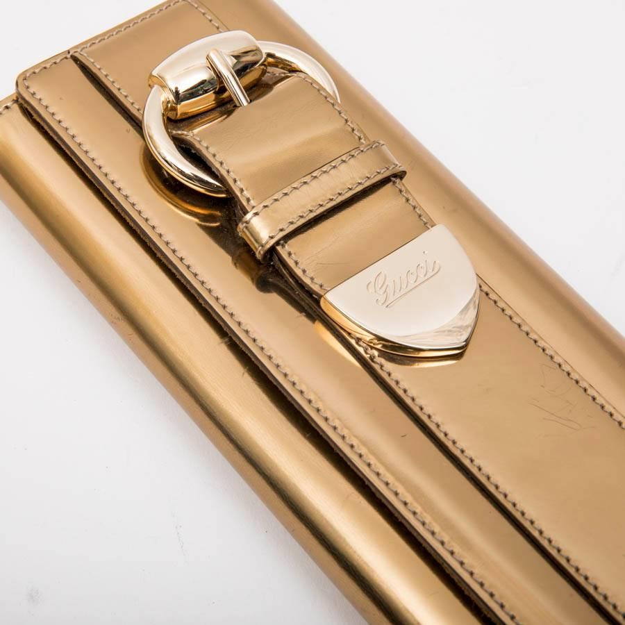 GUCCI Golden Leather Clutch 6