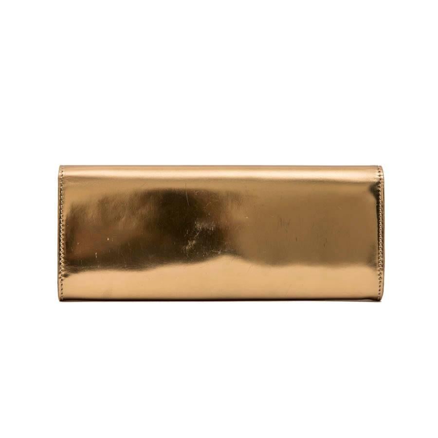 Women's GUCCI Golden Leather Clutch