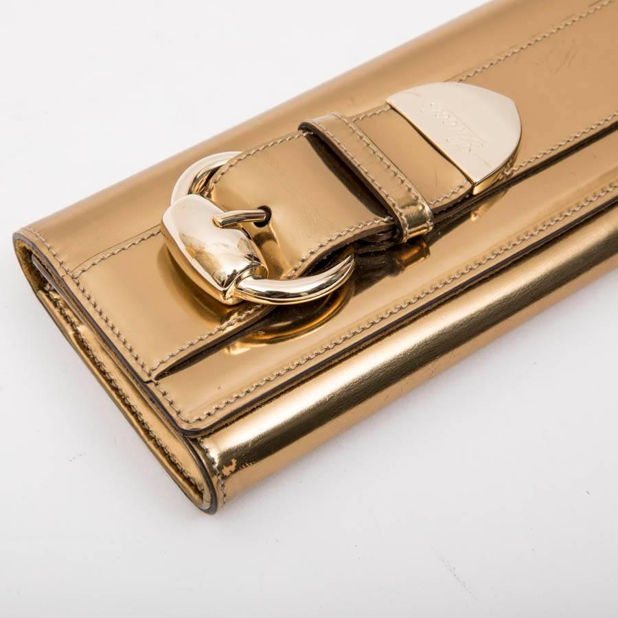 GUCCI Golden Leather Clutch 1