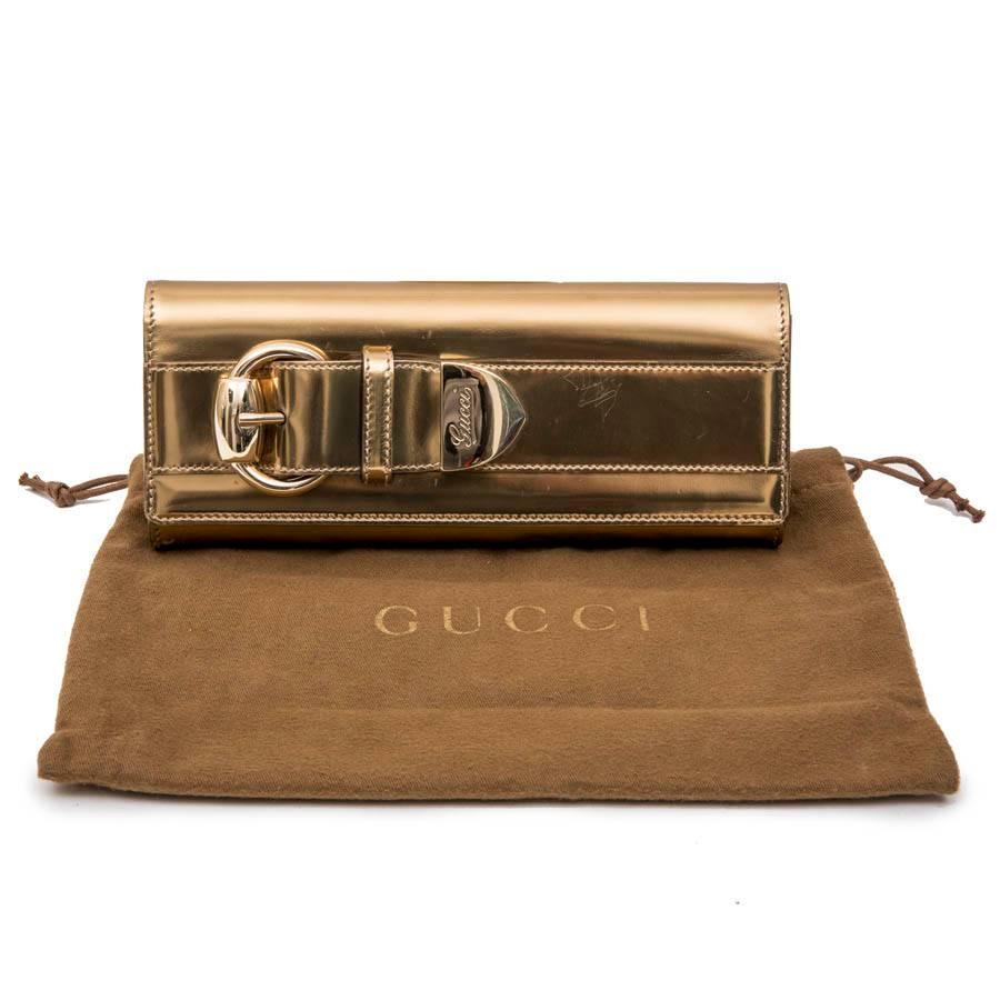 GUCCI Golden Leather Clutch 4