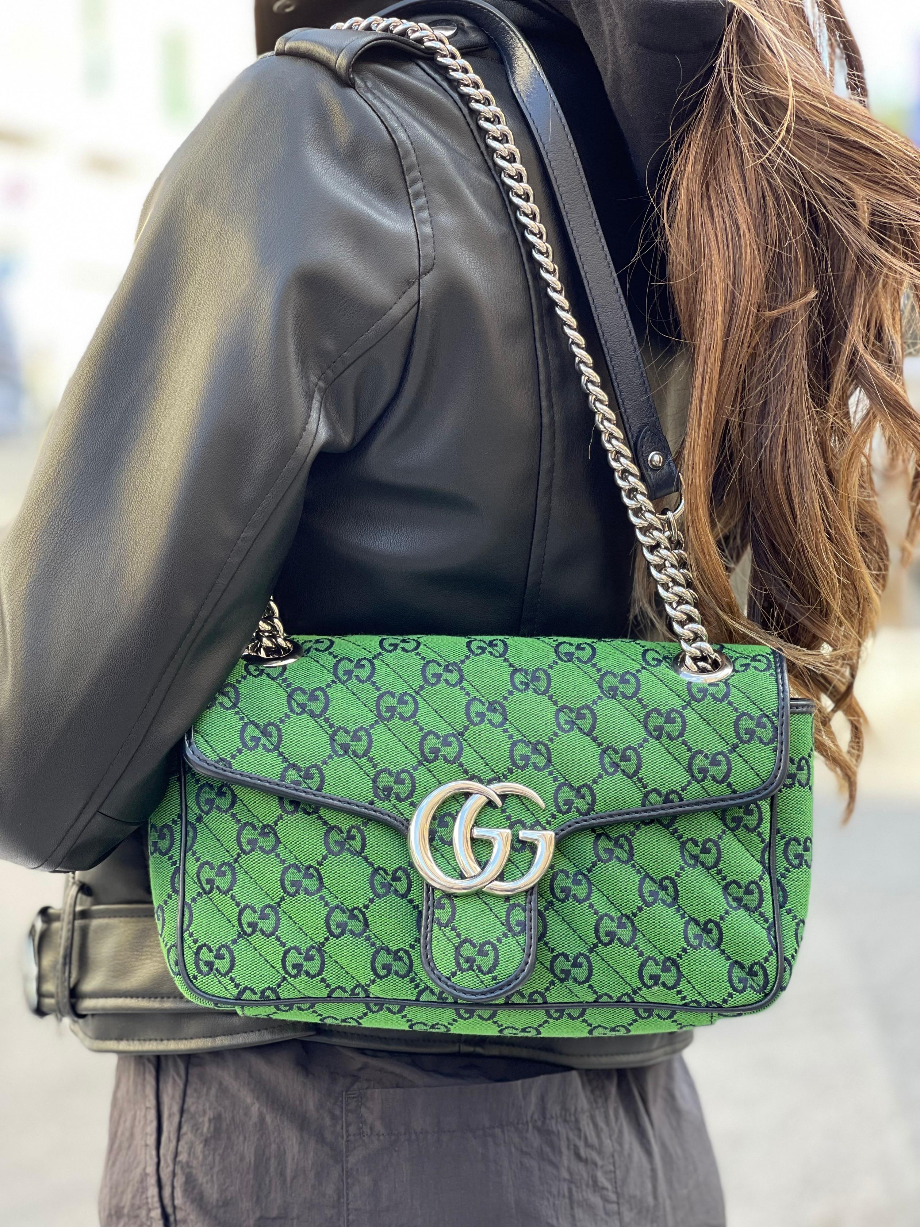 Gucci GG Marmont Multicolor shoulder bag  This bag was first introduced in the 1930s and redesigned over the years.  The bag is in green and blue diagonal matelassé GG fabric, with blue leather trims and silver hardware.  It carries a shoulder strap