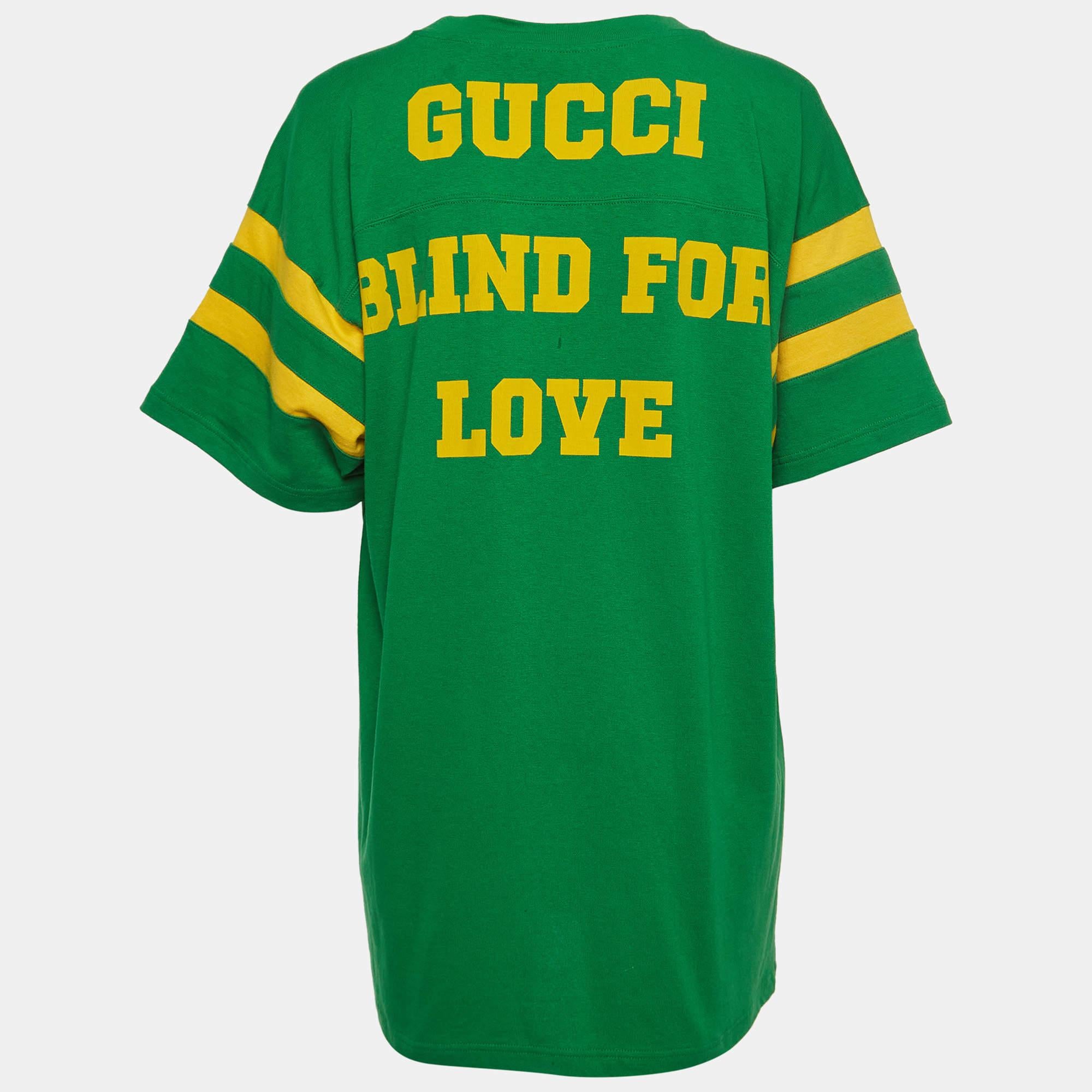 The Gucci t shirt features a vibrant green hue with an intricate eschatology inspired print. Crafted from high quality cotton jersey it offers a comfortable fit and showcases Guccis signature style making it a stylish and eye catching addition to