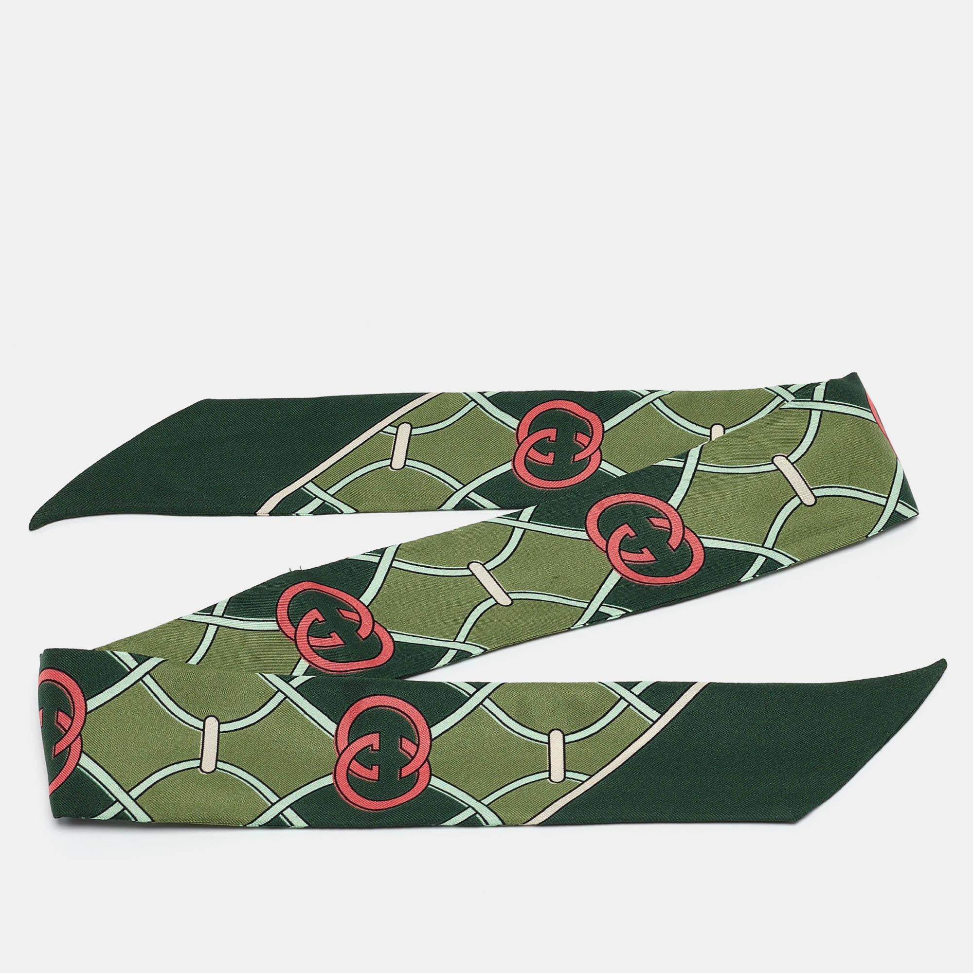 The Gucci bandeau is a luxurious fashion accessory. Made from high-quality silk, it features beautiful colors with intricate prints. This versatile piece can be worn as a neck scarf, headband, or tied to a handbag, adding a touch of elegance to any
