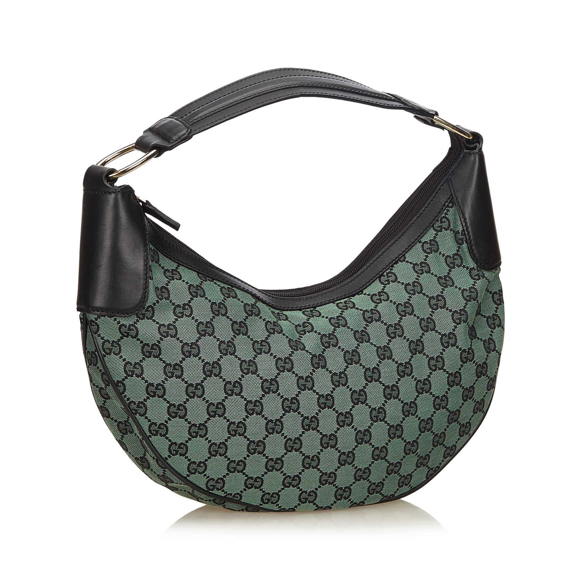 This hobo bag features a jacquard body, a flat leather shoulder strap, a top zip closure, and an interior zip pocket. It carries as AB condition rating.

Inclusions: 
This item does not come with inclusions.

Dimensions:
Length: 20.00 cm
Width: