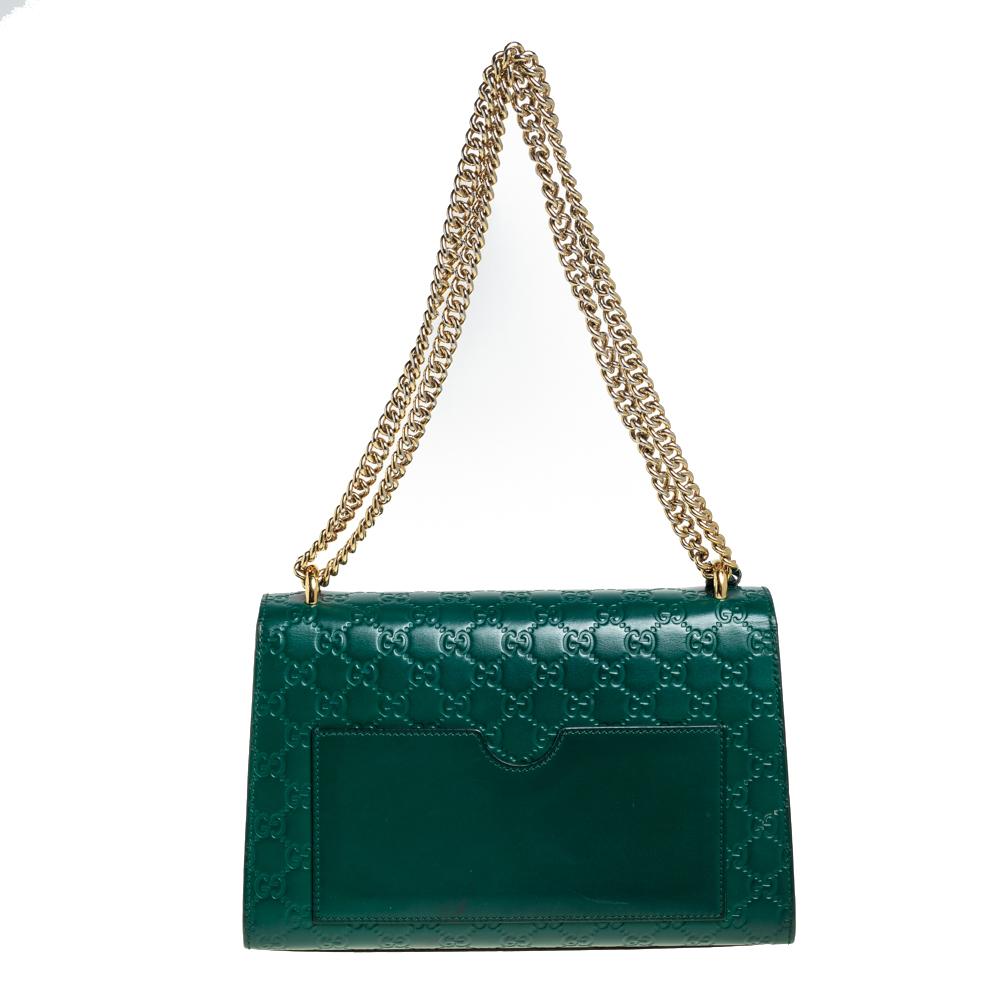 This chic and contemporary Gucci bag will help you outline a stylish look and outshine everyone else! Crafted from Guccissima leather, the rear side comes with a slip pocket for easy organization. The structured silhouette is secured with a
