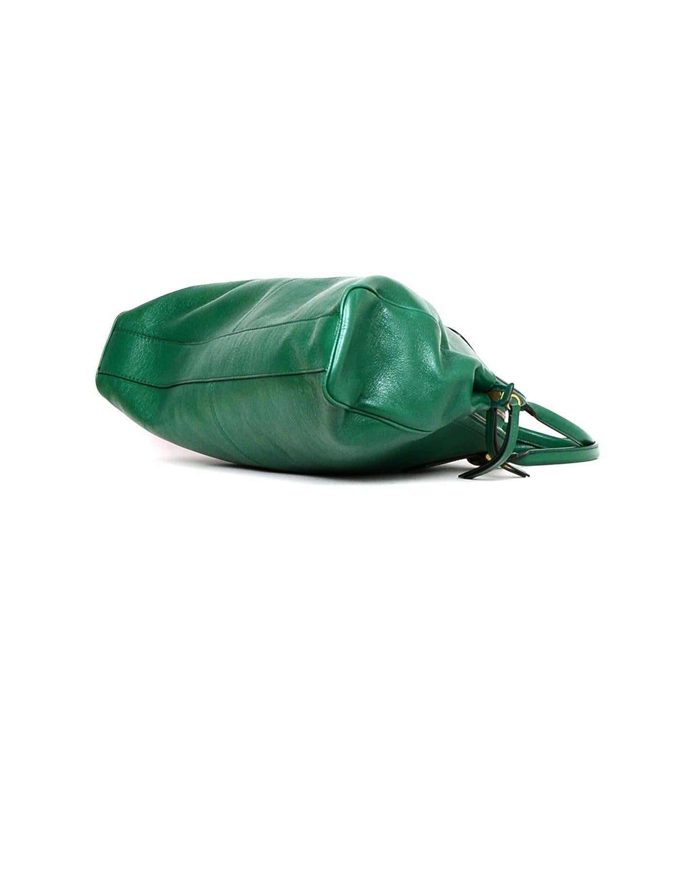 green leather handbags