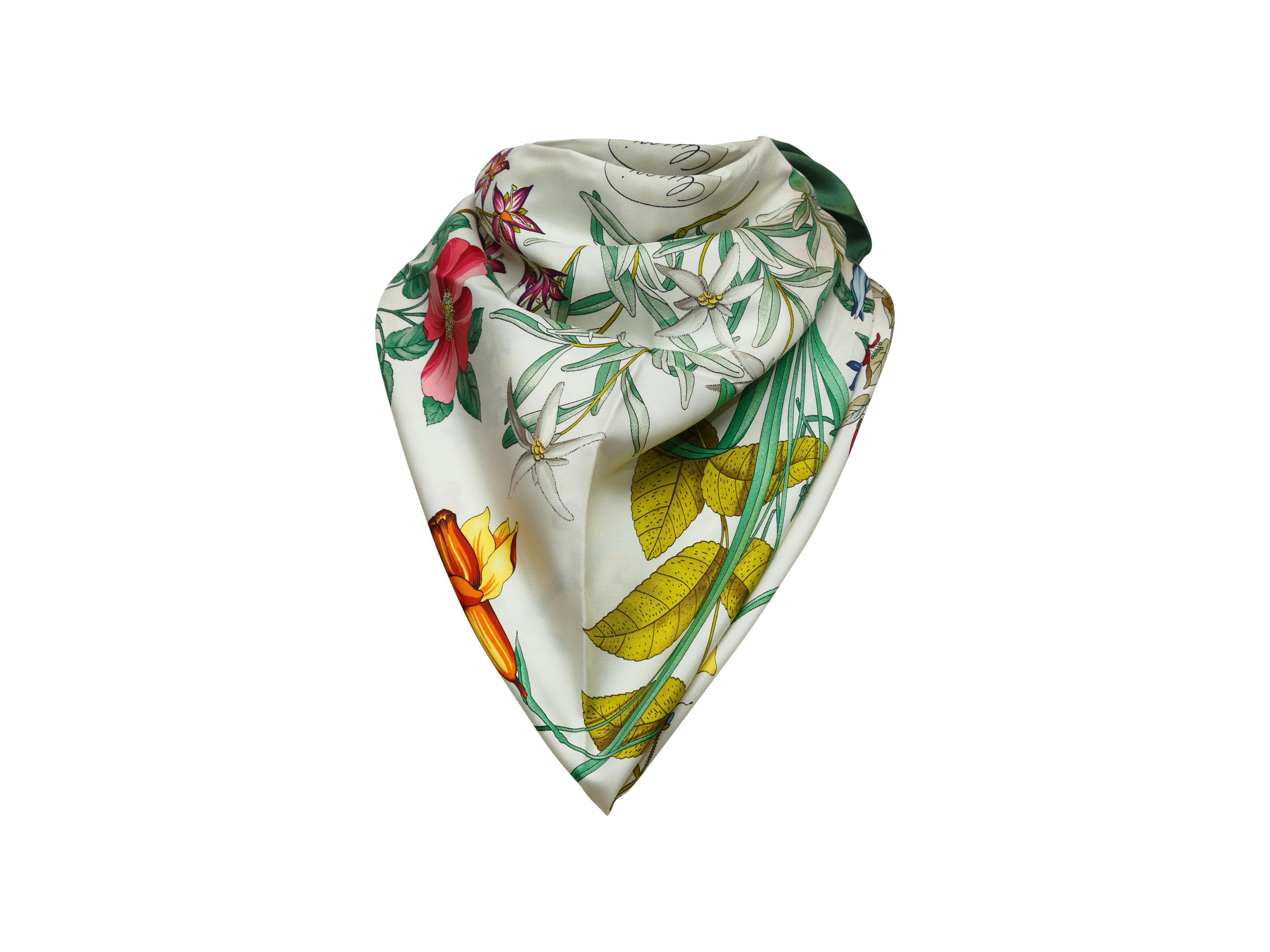 Product details: Vintage green and multicolor silk scarf by Gucci. Flora print throughout. 34
