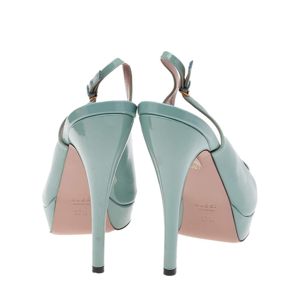A beautiful pair of Gucci shoes that are easy to wear and flaunt, these sandals are highly versatile. Constructed in green patent leather, these shoes feature peep toes, slingback buckle closure, and platforms that make them comfortable to wear for