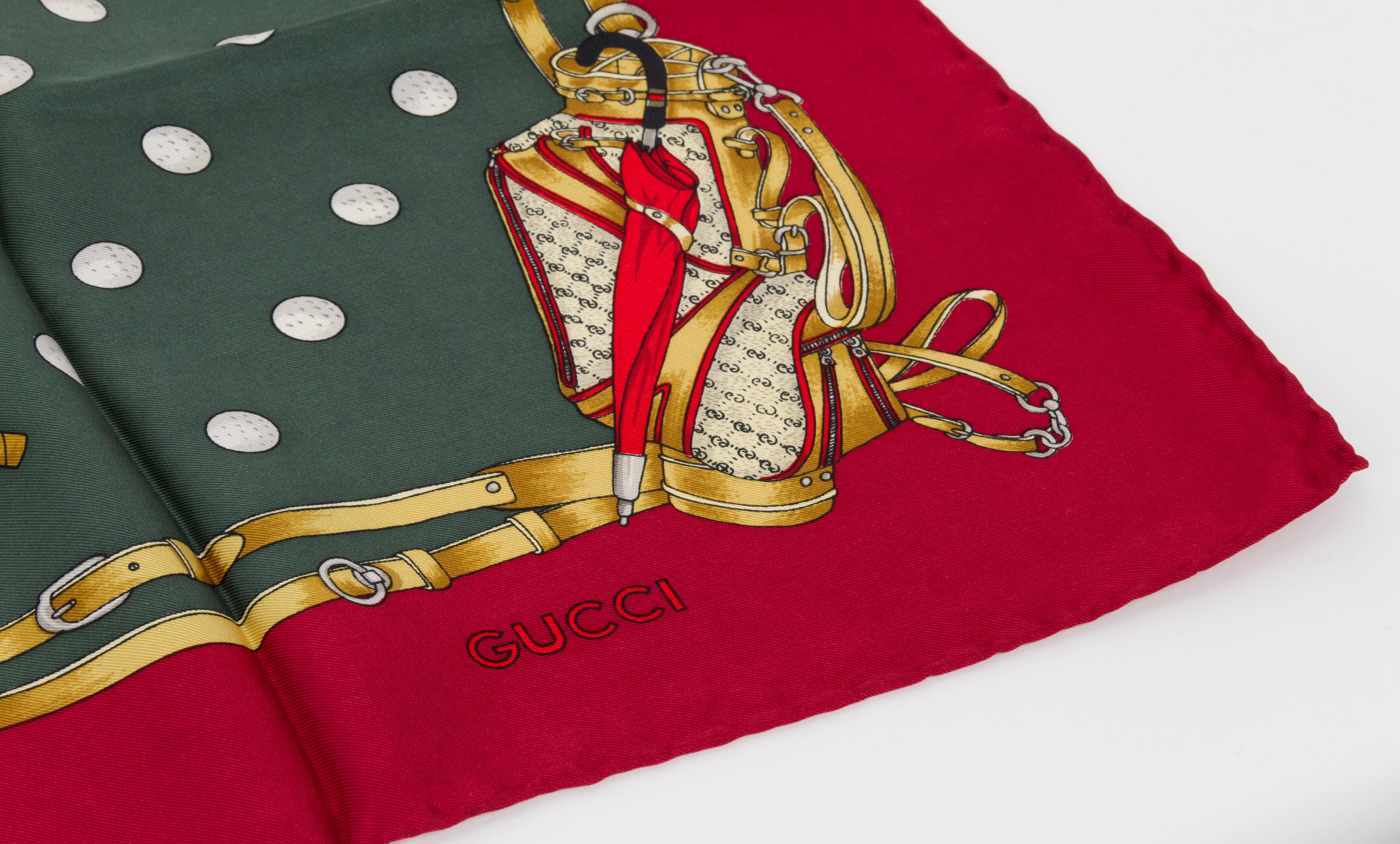 Gucci red and green gold themed silk twill scarf. Hand rolled edges.
