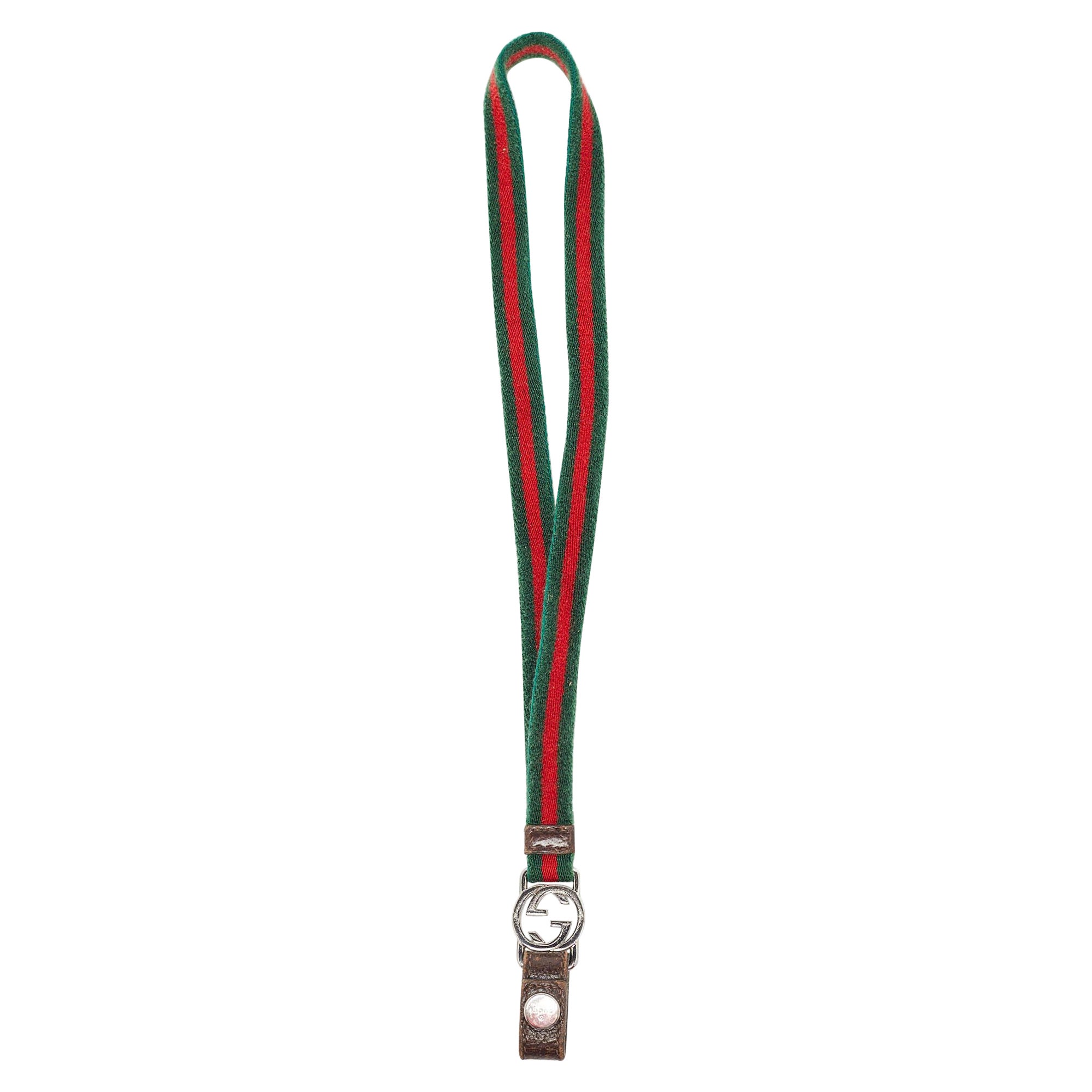 Llavero Gucci en lienzo de tela verde/rojo con G entrelazada