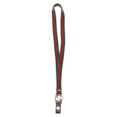 Llavero Gucci en lienzo de tela verde/rojo con G entrelazada