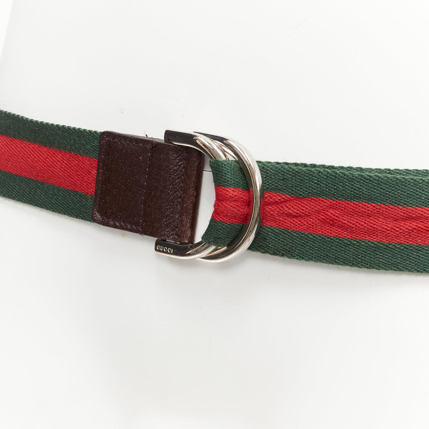 GUCCI green red web fabric silver logo D-ring brown leather belt
Reference: CNLE/A00270
Brand: Gucci
Material: Fabric, Leather
Color: Brown, Red
Pattern: Striped
Closure: Belt
Lining: Red Fabric
Extra Details: Discreet logo engraved on buckle.
Made
