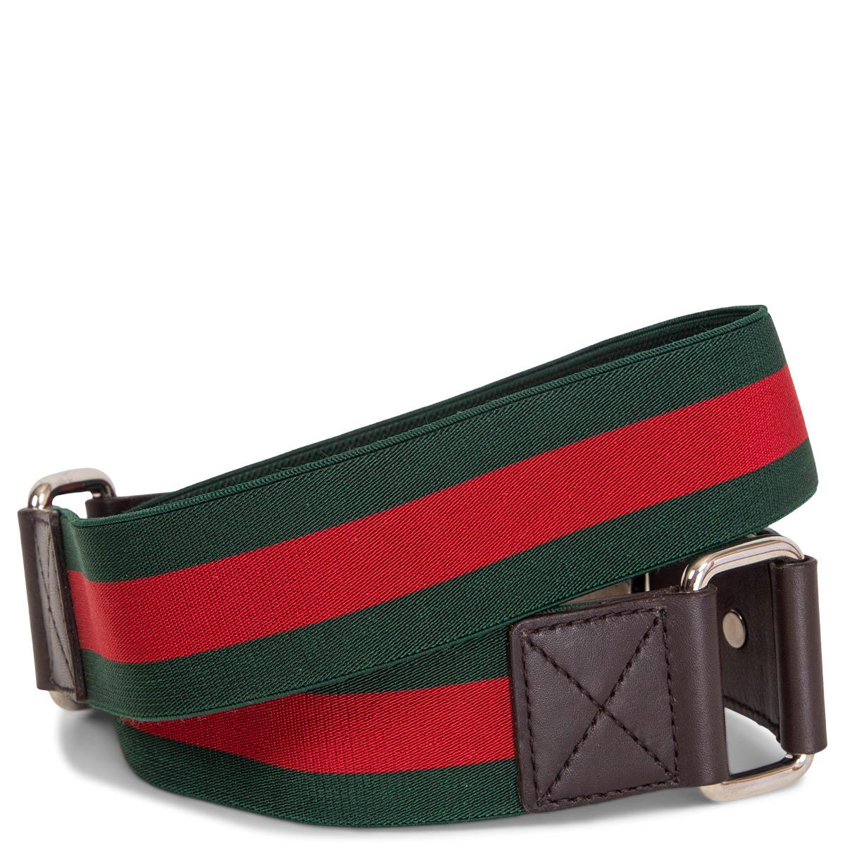 100% authentic Gucci stretchy web belt in red and green canvas and brown leather. Has a silver-tone metal. Has been worn with some scratches on the hardware, otherwise in excellent condition.

Measurements
Tag Size	80
Size	80cm (31.2in)
Width	3.5cm