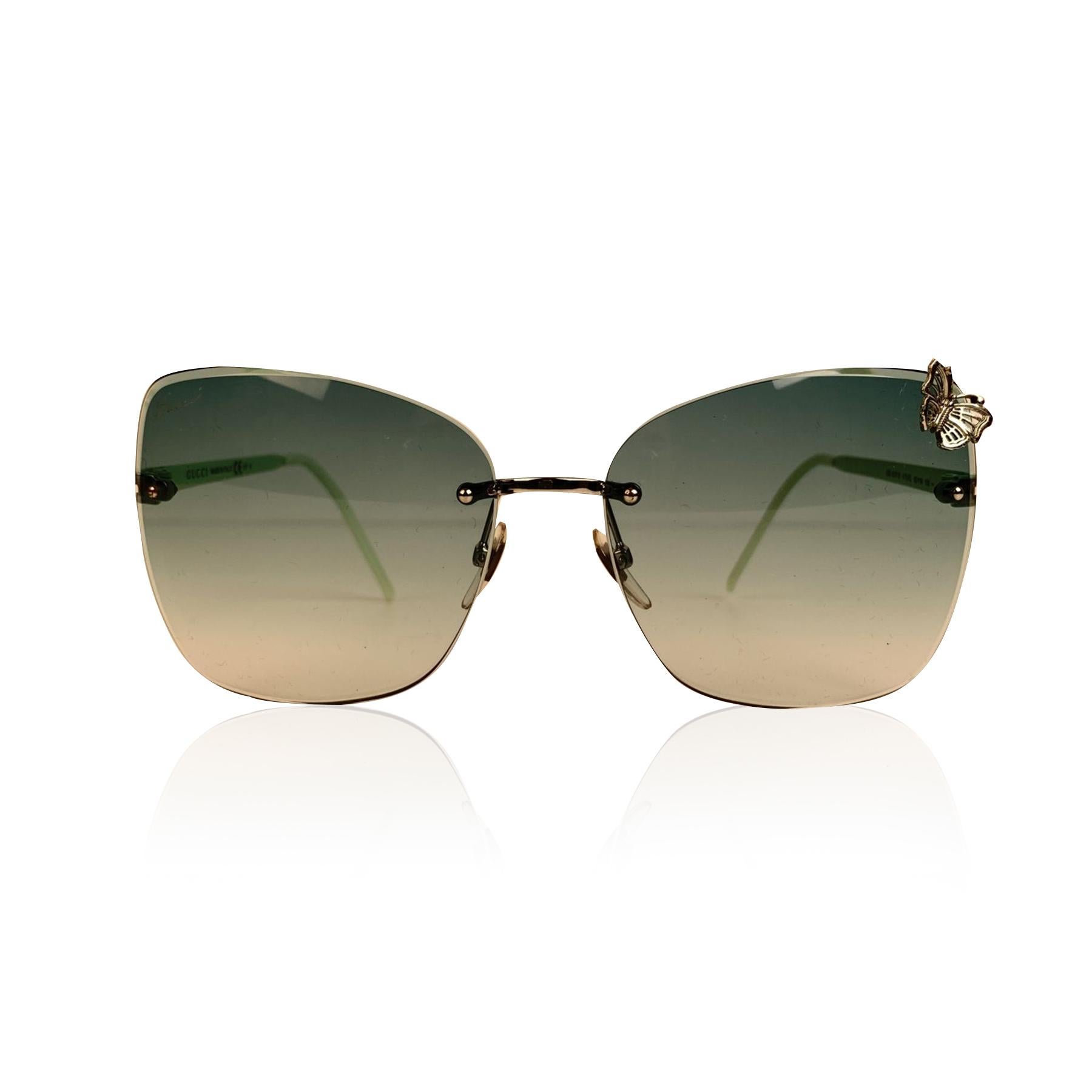 Gucci rimless sunglasses, mod. GG 4217/S. Silver metal Butterfly detailing on left corner. Gradient green lenses. Gucci.ignature on temples. Made in Italy. Style & refs: GG 4217/s - KTU7L - 62/16 - 130

Details

MATERIAL: Acetate

COLOR: