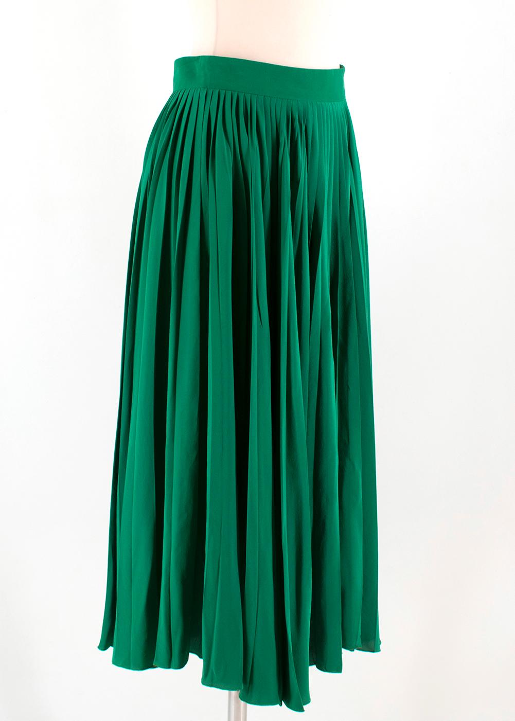 Gucci Green Silk Pleated Midi Skirt

- Green silk midi skirt 
-Accordion pleats
- Hidden side zip fastening
- Unlined 

Please note, these items are pre-owned and may show some signs of storage, even when unworn and unused. This is reflected within