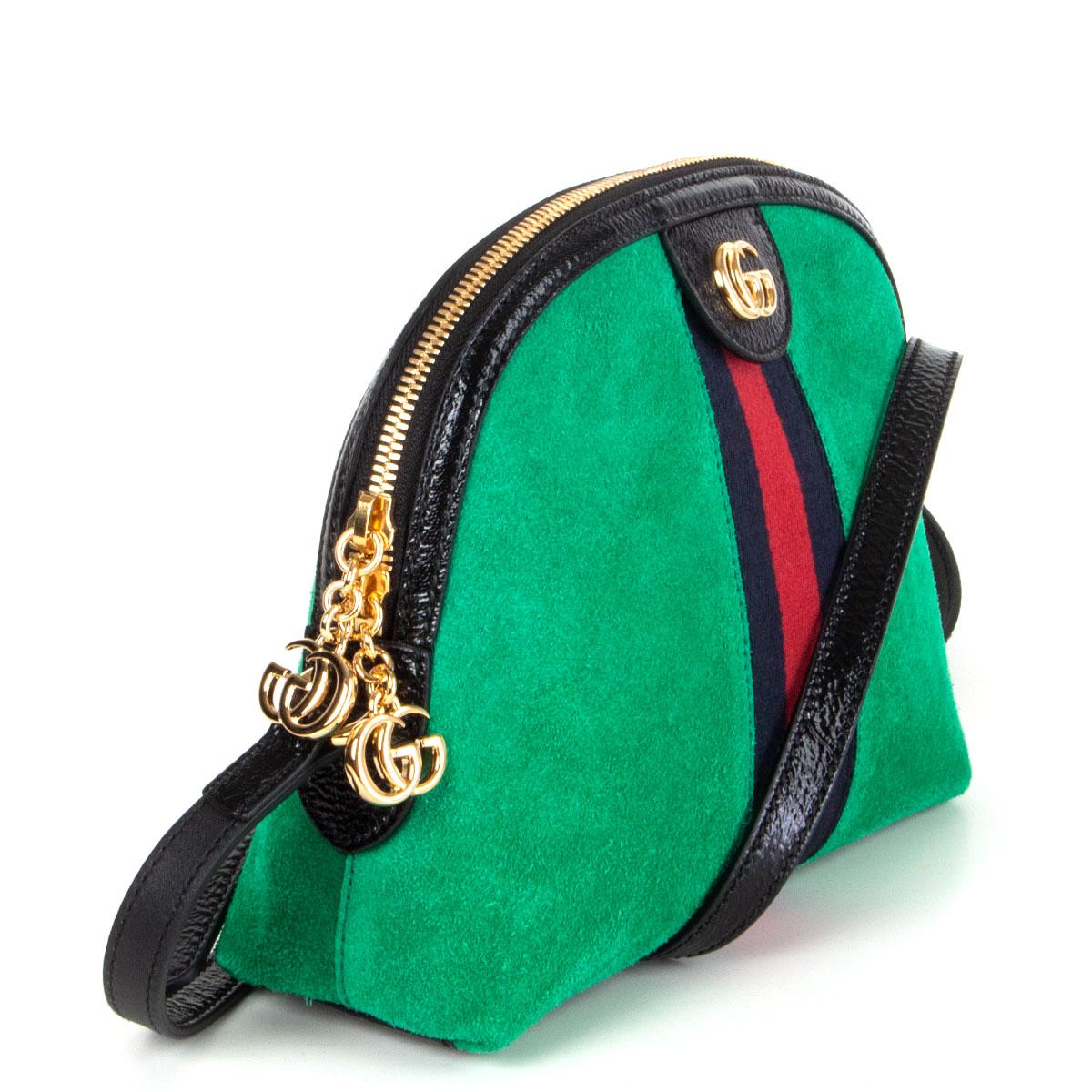 100% authentic Gucci 'Ophidia' shoulder bag in acid-green suede with blue-red web stripe and n black cracked leather trim. Gold-tone GG logo on the front. Closes with a two-way zipper on top. Lined in blue satin with an open pocket against the back.