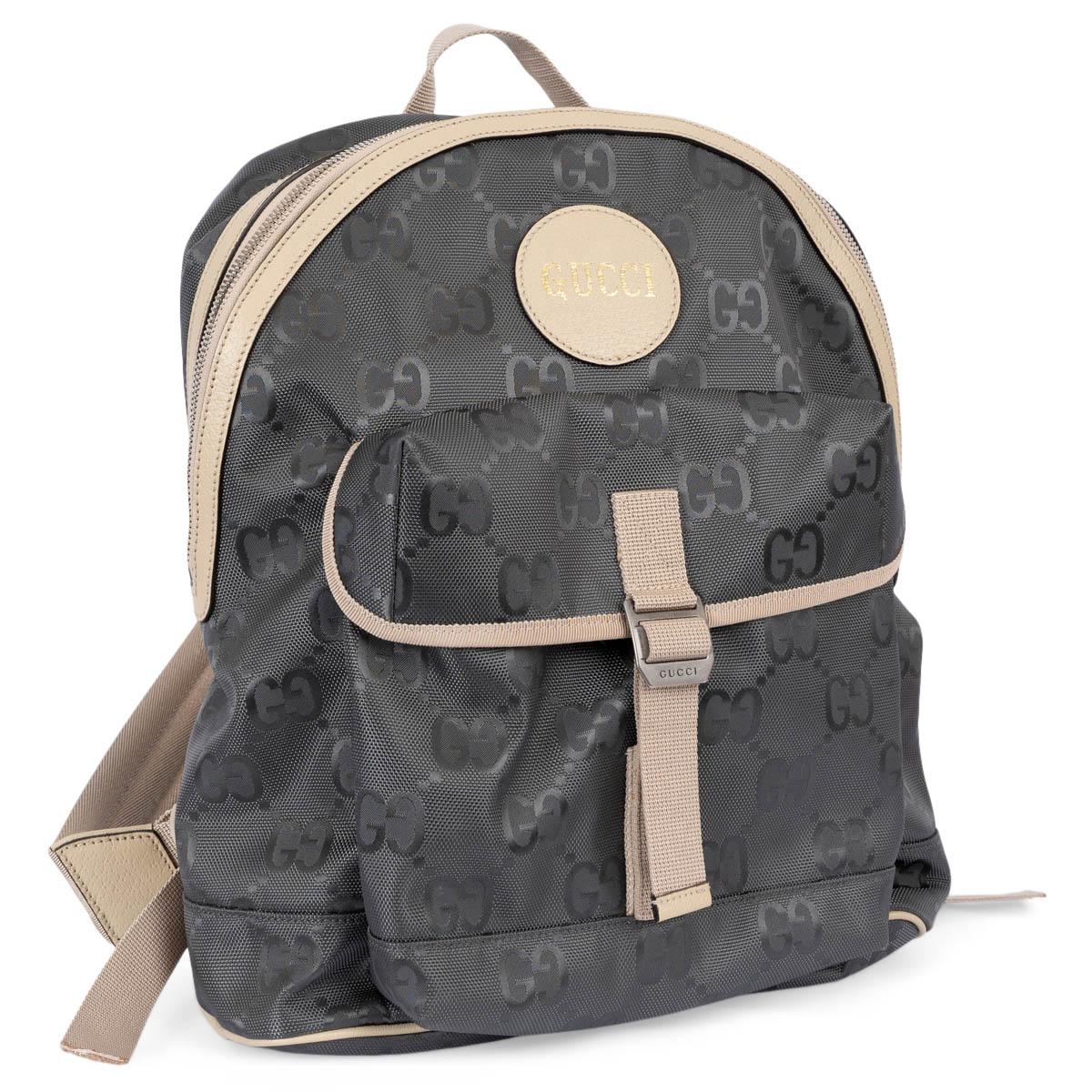 100% authentic Gucci Off the Grid backpack in grey ECONYL® canvas with pale beige leather and nylon trim. The design features the classic monogram pattern, silver-tone hardware, logo patch to the front with gold-tone lettering, single top handle,