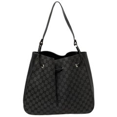 Gucci Grey/ Black GG Canvas And Leather Drawstring Hobo Gucci Grey/ Black GG Canvas And Leather Drawstring Hobo