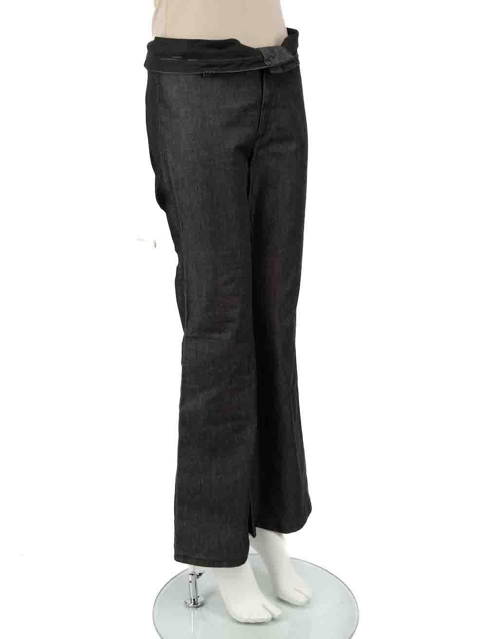 CONDITION is Very good. Hardly any visible wear to trousers is evident on this used Gucci designer resale item.
 
 
 
 Details
 
 
 Grey
 
 Cotton
 
 Trousers
 
 Flipped waistband detail
 
 Mid rise
 
 Flared leg
 
 Fly zip and button fastening
 
 
