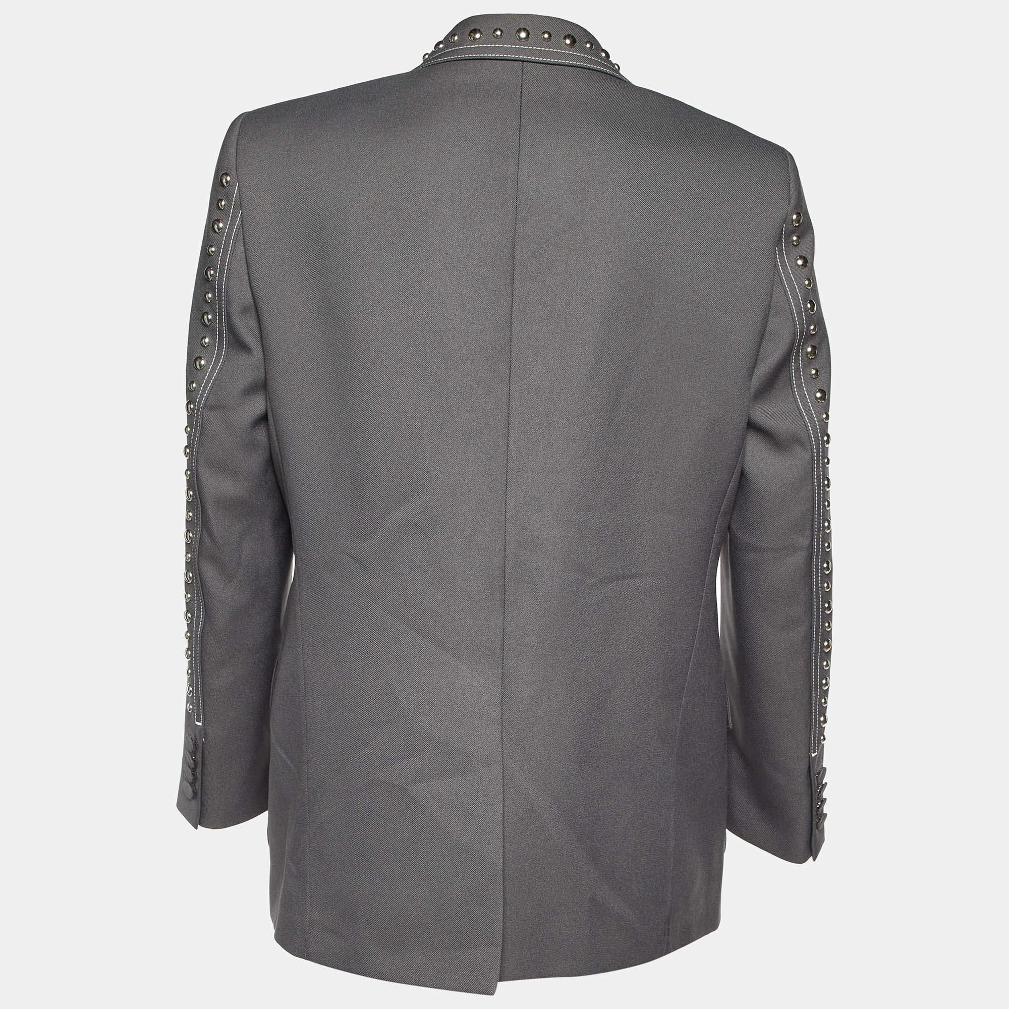 Carry an elegant look every time you get into this Gucci blazer. It is tailored from gaberdine into a double breasted silhouette. Comfortable and stylish  this blazer is complete with long sleeves  pockets sand notched lapels. Establish a