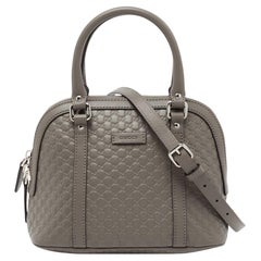 Mini sac à main Gucci en cuir microguccissima gris à dôme
