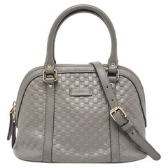 Mini sac à main Gucci en cuir microguccissima gris à dôme