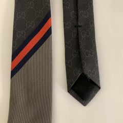 GUCCI Graue Seidenkrawatte mit gemischtem Muster aus Baumwolle