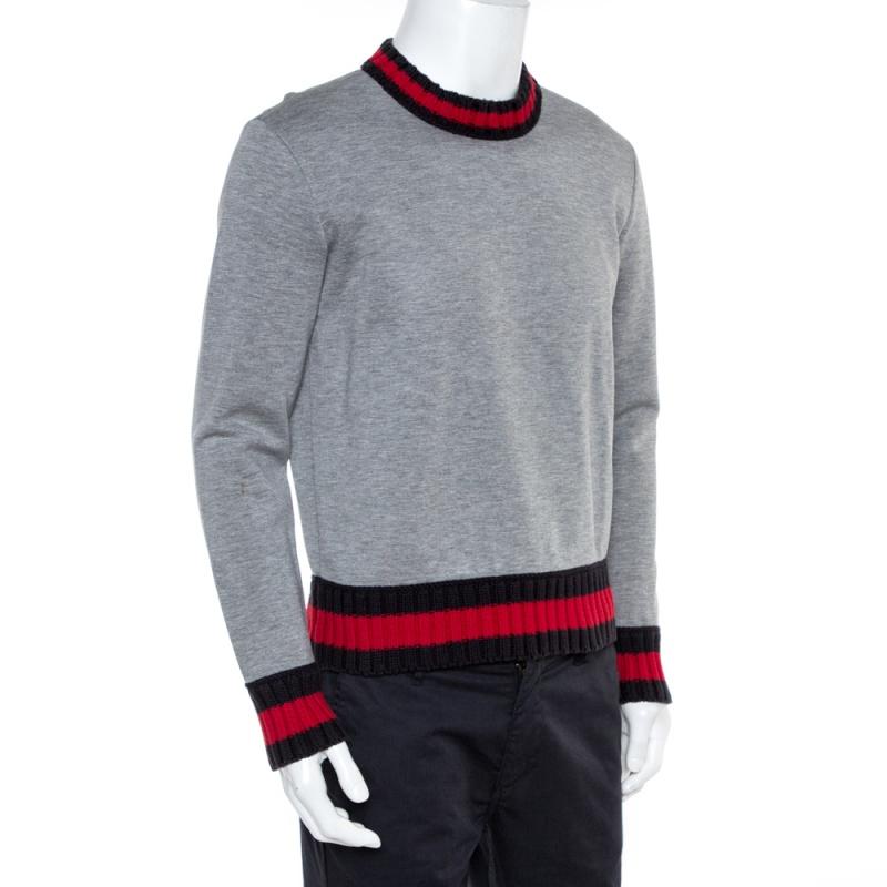 This Gucci sweatshirt for men is made using quality materials and feature contrasting trims on the neckline and long sleeves. Cut to a relaxed fit, it will look great when paired with pants or shorts.

