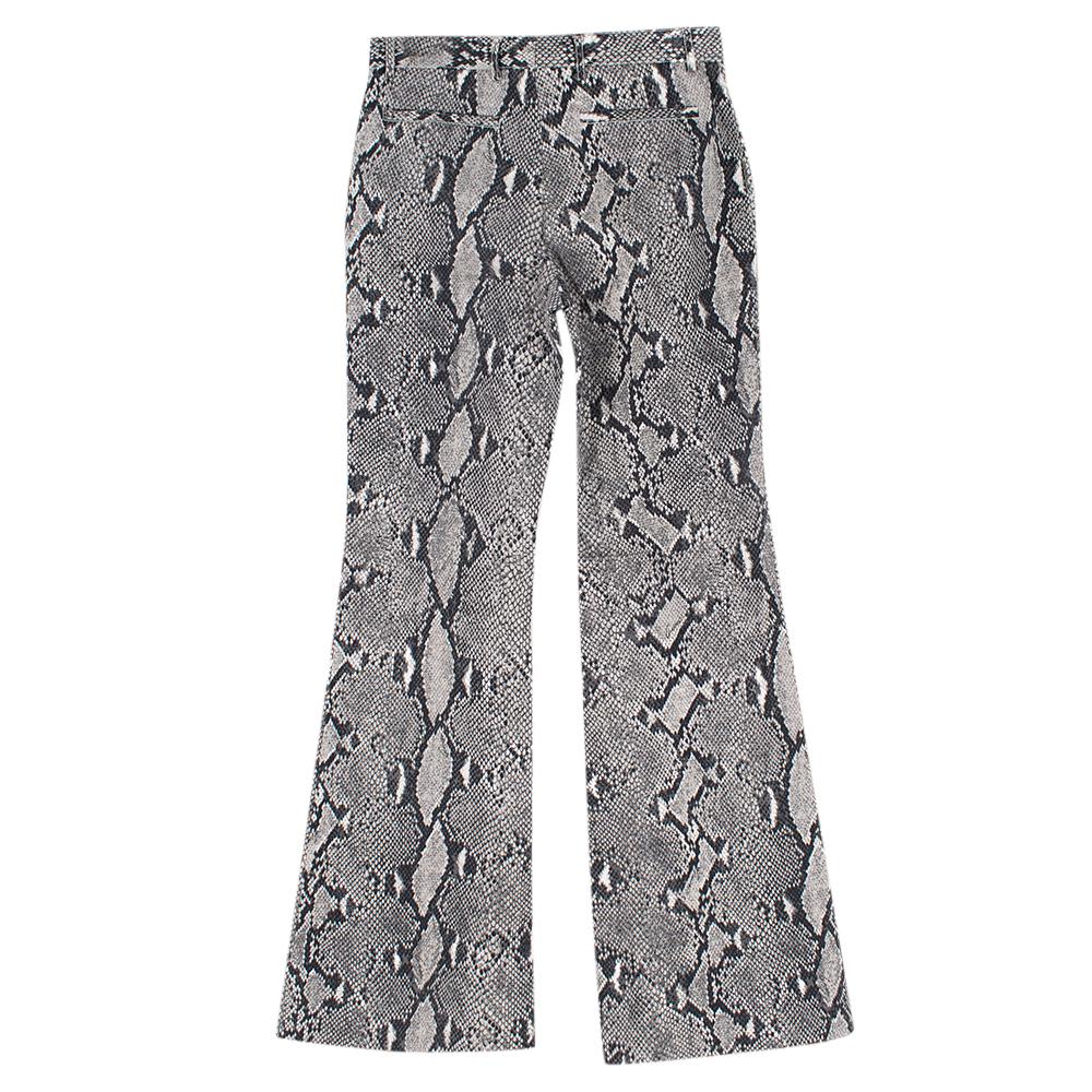 Gucci Grey Snake Print Wide Leg Trousers

Grey snake print 
Wide leg
Flare leg design 
Two back pockets
Hook and eye closure
Central zip closure 
Beige hardware
Gucci signature design 

Please note, these items are pre-owned and may show some signs