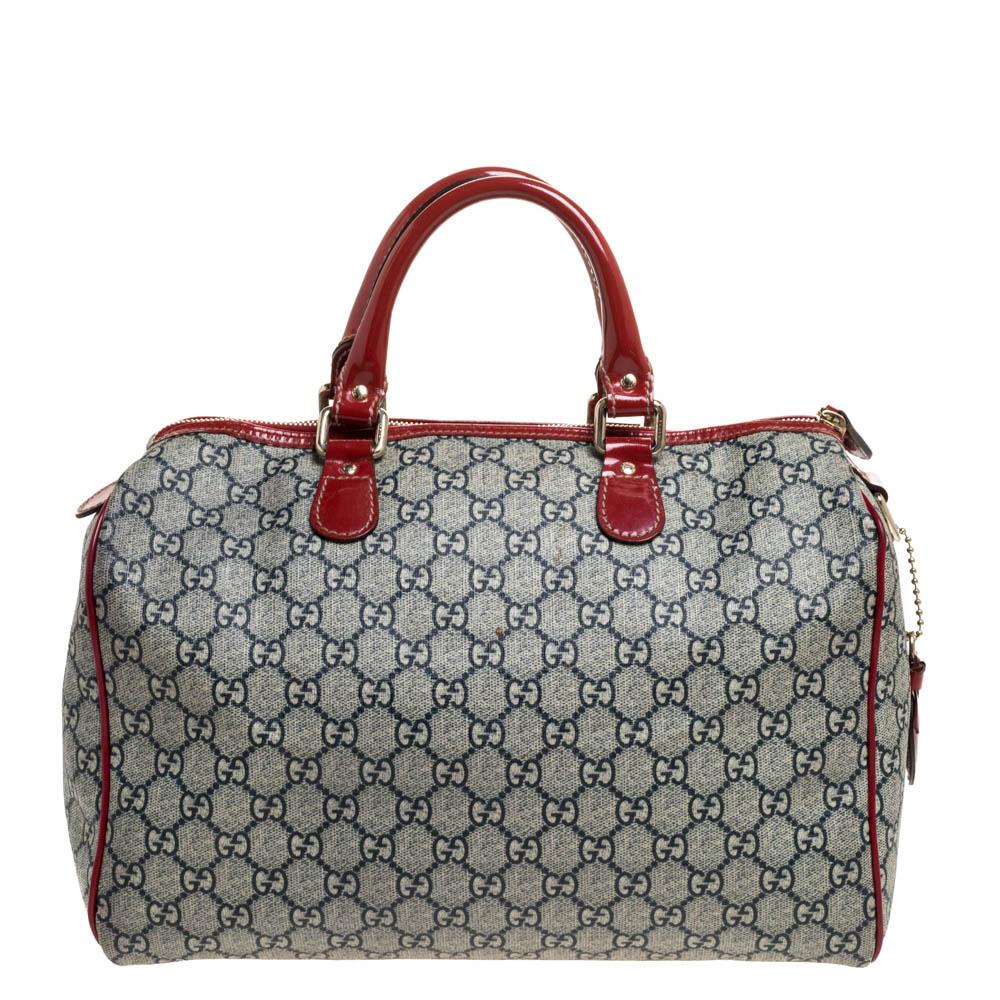 This satchel is made out of the grey GG monogram coated canvas with red patent leather trims. Accented with gold-tone hardware and brand logo, the top zip closure opens to a canvas-lined interior that features a patch pocket. The purpose of the