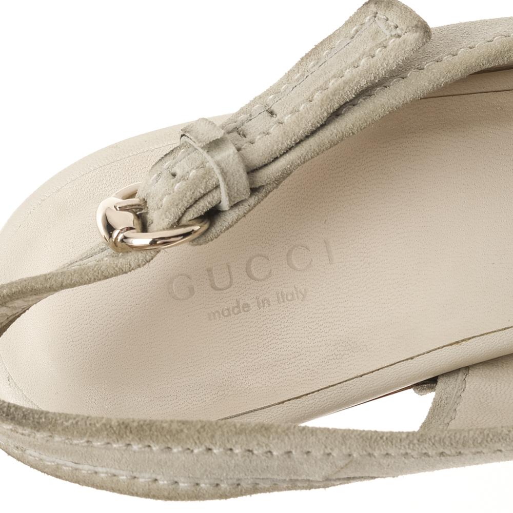 Coming from the House of Gucci, these sandals will make you super trendy and stylish! They are made from grey suede on the exterior and feature platforms, a slingback, and sturdy heels. They are elevated with gold-tone hardware.

