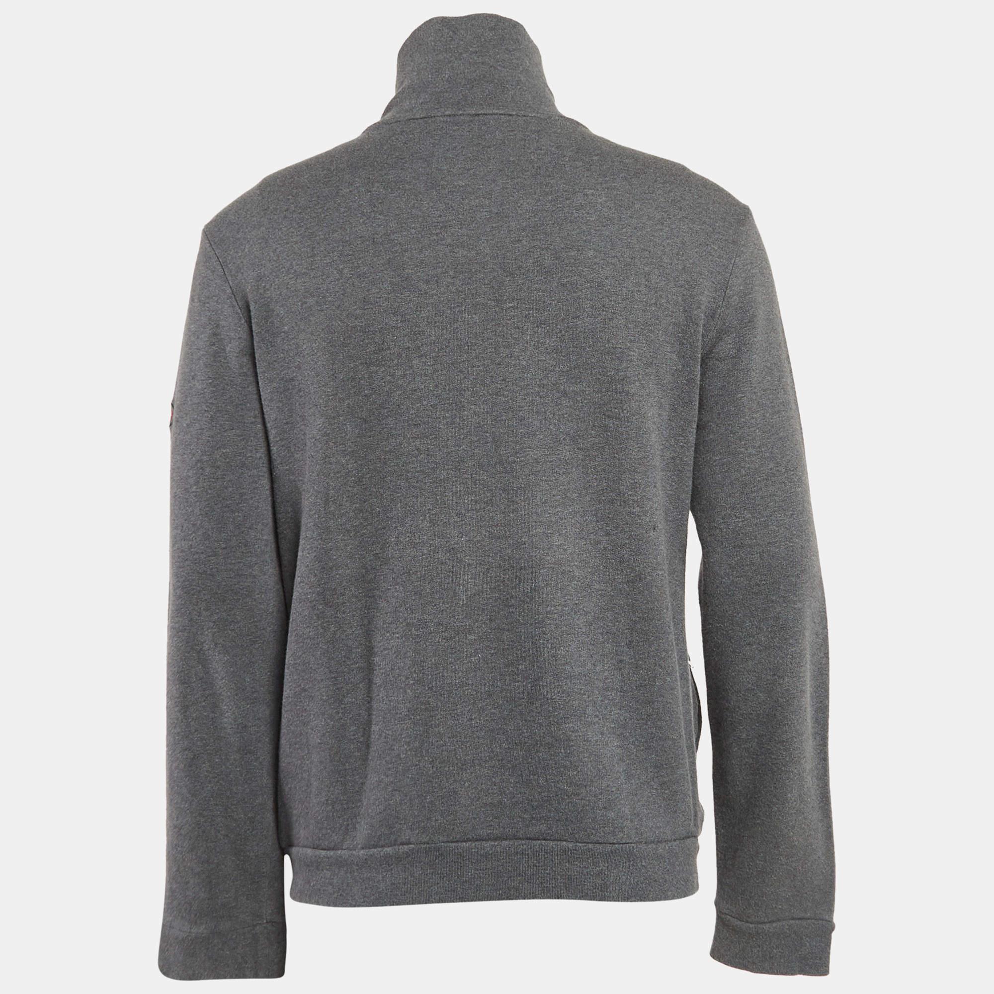 This grey hoodie from Gucci is for men. Made of cotton knit fabric it has a full front zipper enhanced with the green red green Web trim. Embrace all day comfort with this creation.