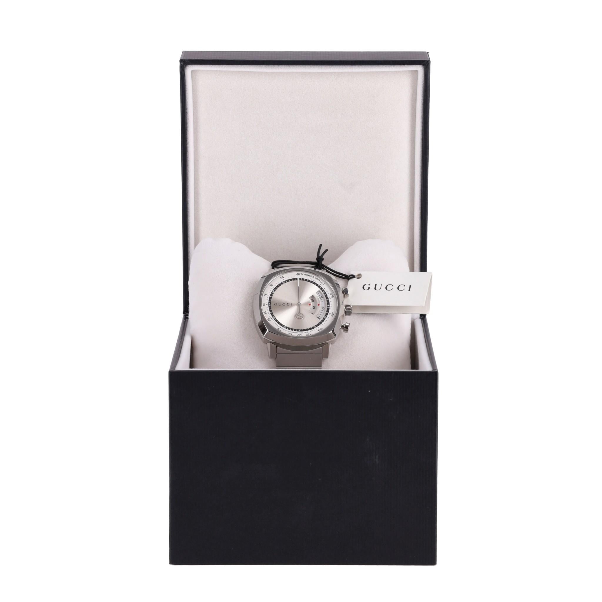 Brand New- Gucci Grip Chronograph Stainless Steel Watch

Crafted from stainless steel, features a 40mm case and a silver dial adorned with the iconic Gucci engraving and hand with logo.

Sapphire crystal glass and the dial features a two-window