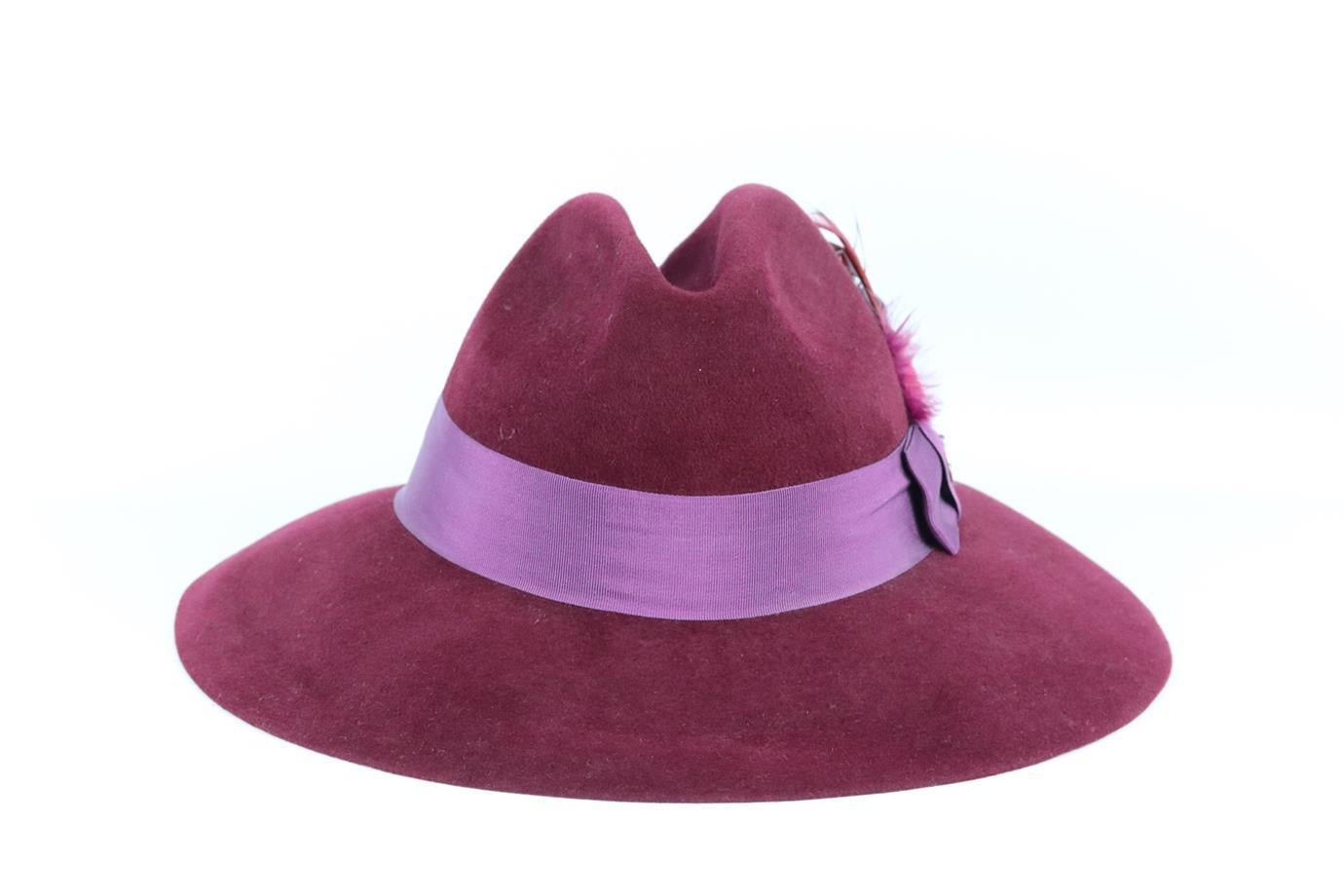 Gucci grosgrain trimmed rabbit felt fedora. Burgundy. Pull on. 100% Rabbit; trim: 56% cotton, 44% viscose. Does not come with dustbag or box. Size: Medium. Circumference: 23.6 in. Brim Width: 3.5 in. Very good condition - Light signs of wear; see