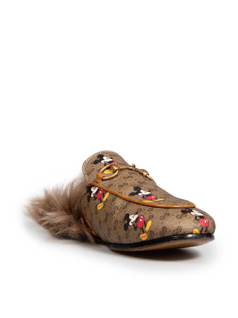 CONDITION is Very good. Hardly any visible wear to mules is evident on this used Gucci designer resale item. This item comes with a dust bag.
 
 Details
 Gucci x Disney
 Model: Princetown
 Brown
 Coated canvas
 Mules
 Supreme GG and Mickey Mouse