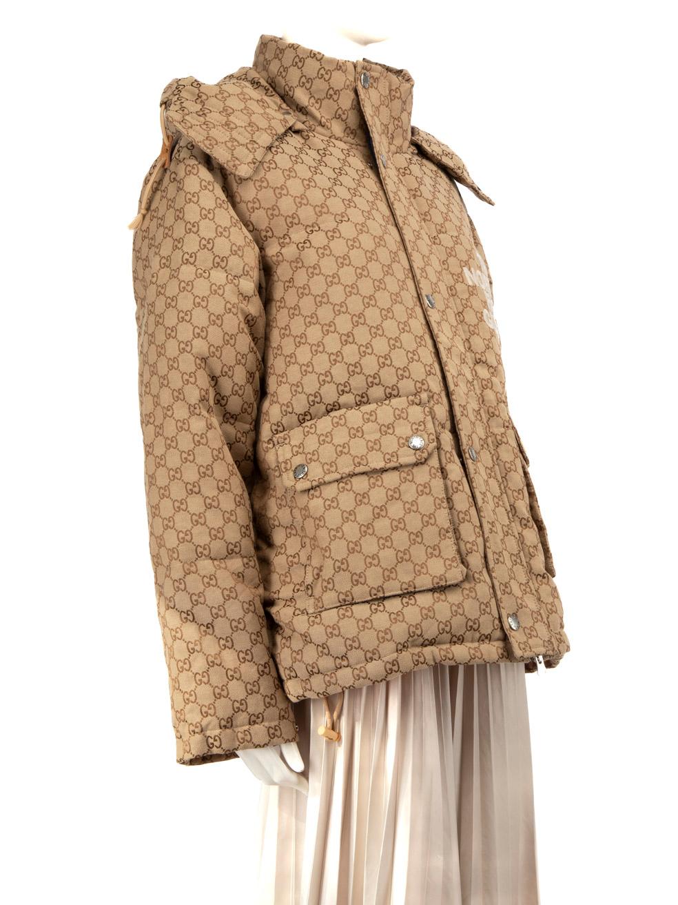 CONDITION is Very good. Hardly any visible wear to the coat is evident on this used Gucci designer resale item.
 
Details
 
 
 Beige
 
 Cotton
 
 Puffer coat
 
 Long sleeved
 
 Logo embroidery detail
 
 Monogram print
 
 Detachable hood
 
 Logo