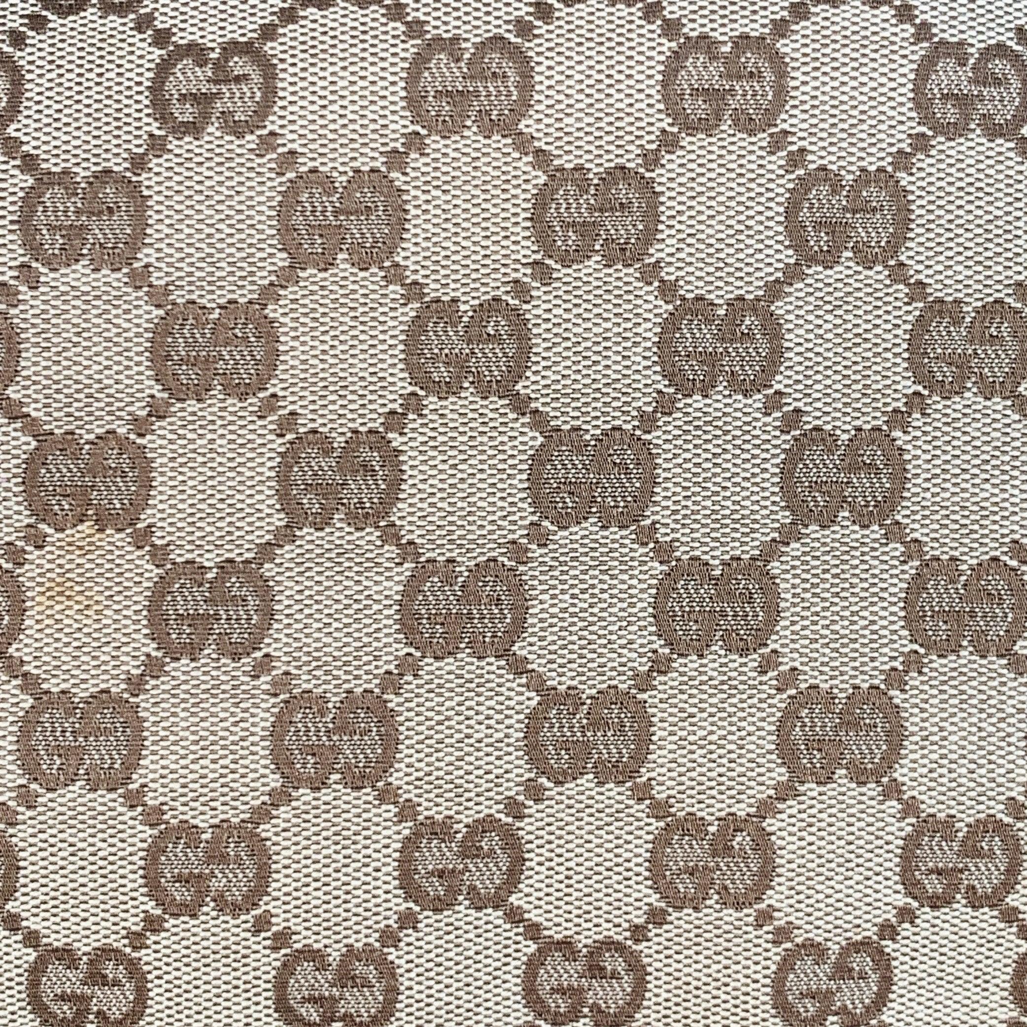 GUCCI messenger bag
in a brown leather and beige canvas featuring leather trim, signature Guccissima monogram pattern, and double hook & loop closure. Comes with dust bag. Made in Italy.Excellent Pre-Owned Condition. 

Marked:   145850 002122