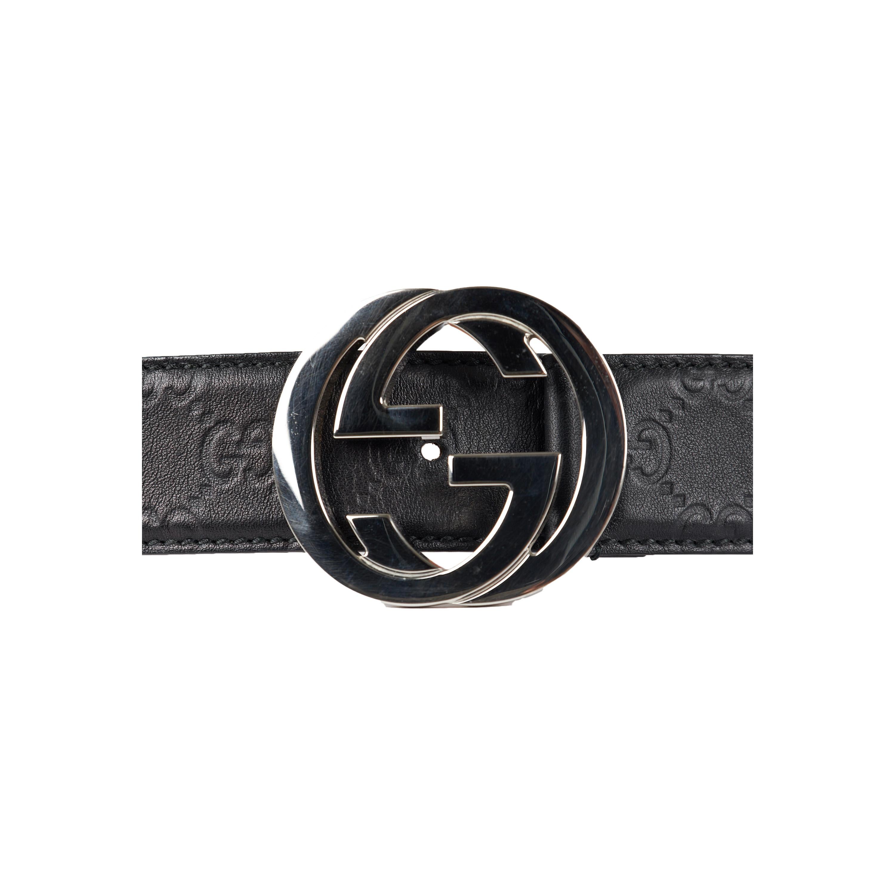 This elegant Gucci Interlocking G belt, crafted from quality black leather, is embossed with the GG Guccissima pattern and finished with a timelessly stylish silver tone Interlocking G buckle. Luxurious yet practical, it is the perfect accessory for